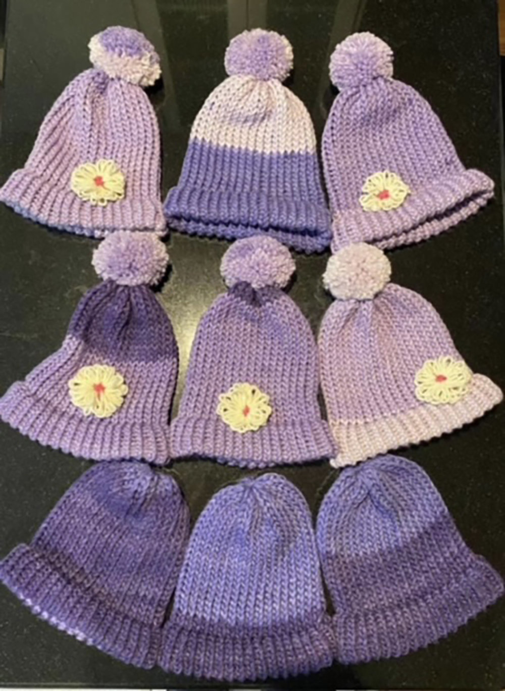 The purple hats were made and given to the Alzheimer’s Association for their annual Walk to End Alzheimer’s.